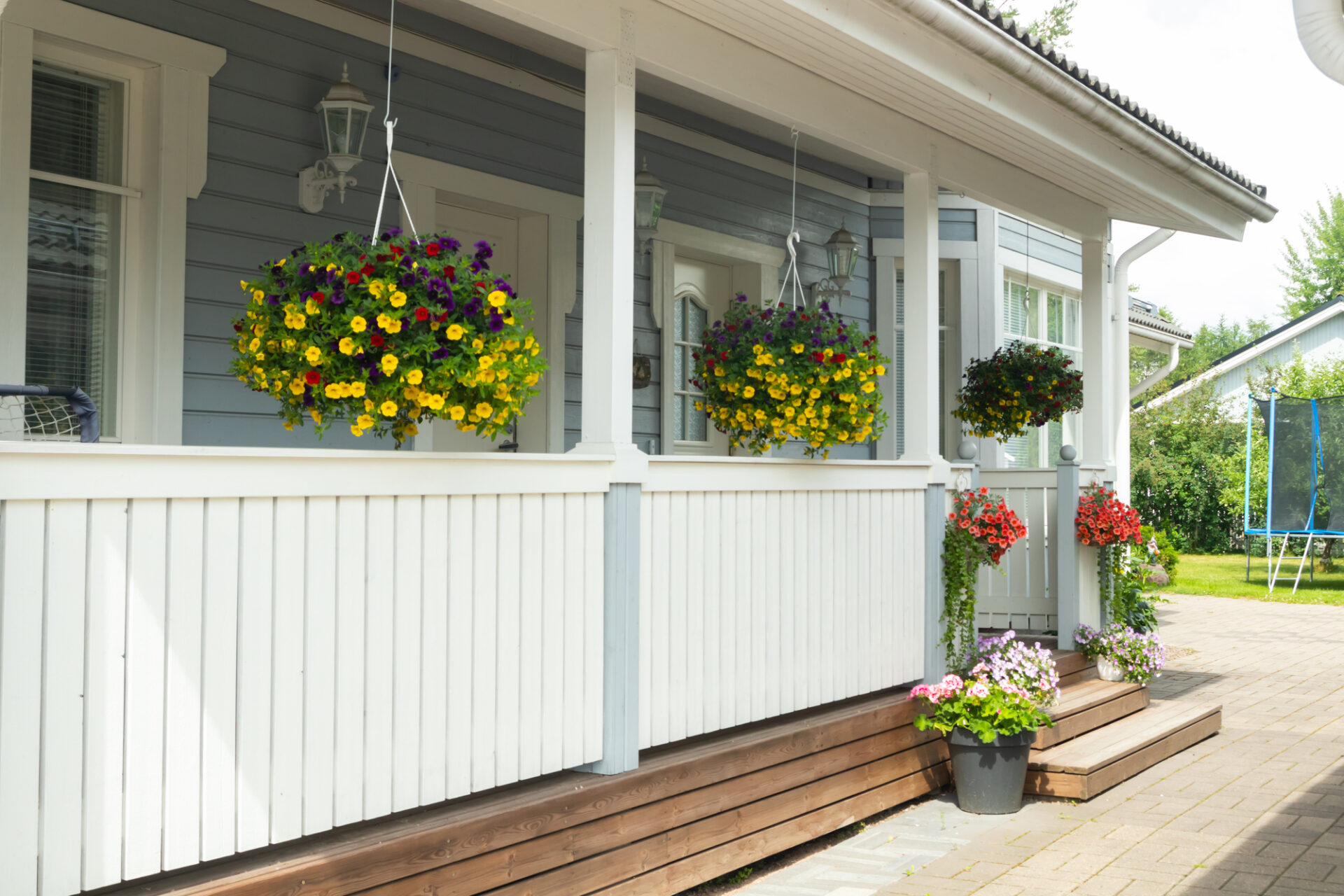 Traditional wooden house decorated with flowers in Finland